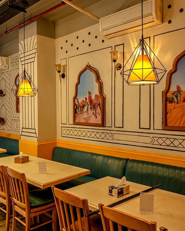 Rajdhani Delights thali being served with masala chai